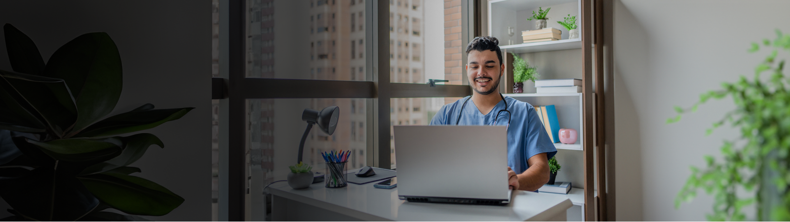 Veterinarian or veterinary technician attending online class.